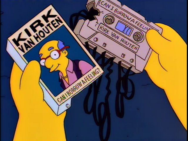 The Simpsons: Yellow hands hold a destroyed cassette tape. The text on the case and the tape itself tell us this is Kirk Van Houten's single, "Can I Borrow a Feeling?"