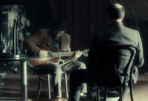 Llewyn Davis performs for a record exec.
