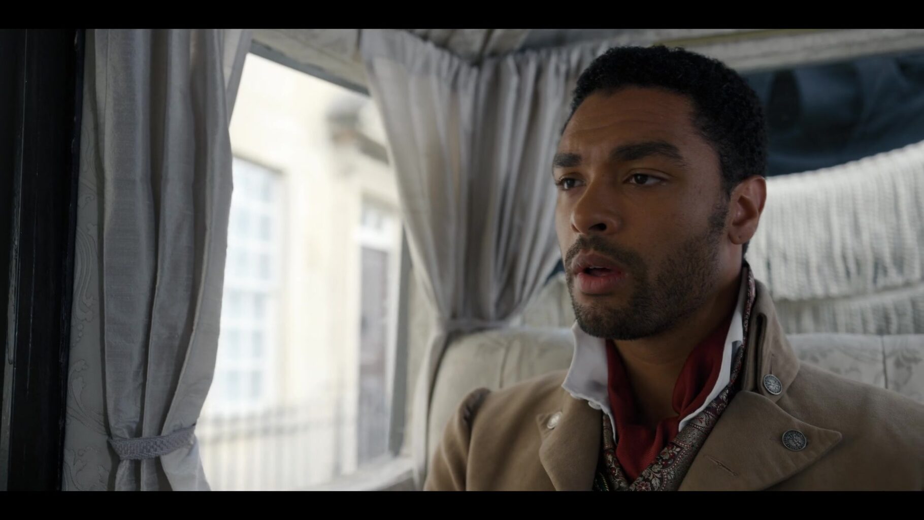 Mr. Page in a scene from Bridgerton. Screencap from Cap-That.com.